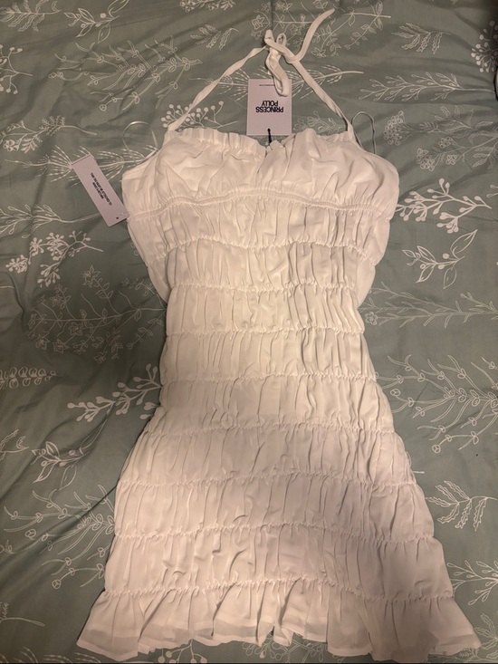 Princess Polly Dresses & Skirts - Princess Polly White Smocked Halter Mini Dress with Ruffle Hem. Never Worn